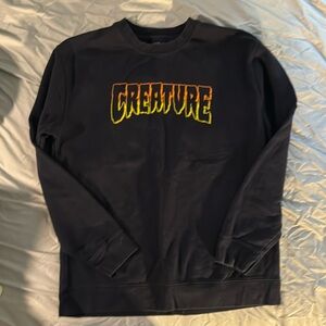 Creature sweatshirt